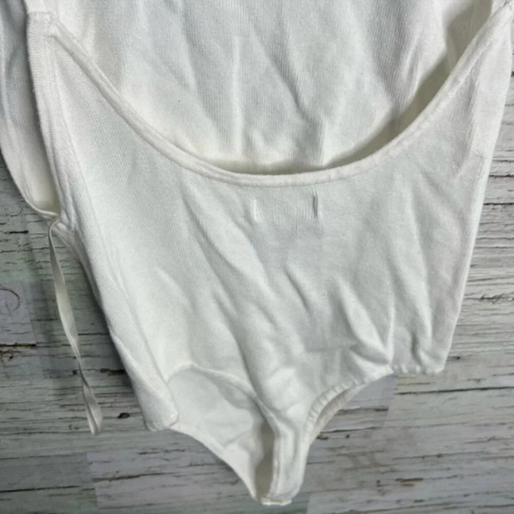 White by the way. Revolve bodysuit size small - Picture 5 of 7